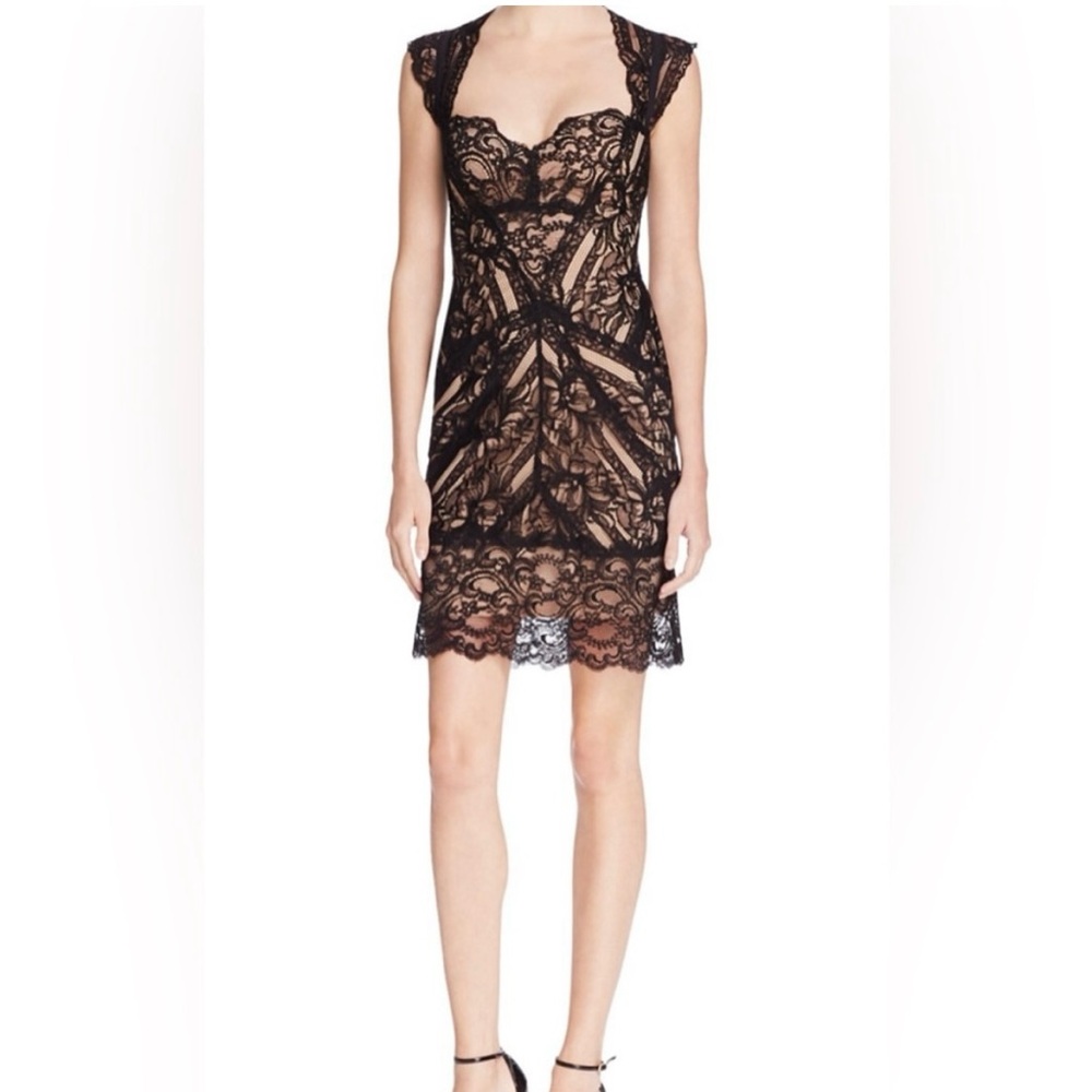 Nicole Miller size small black lace with nude lining. Excellent condition.